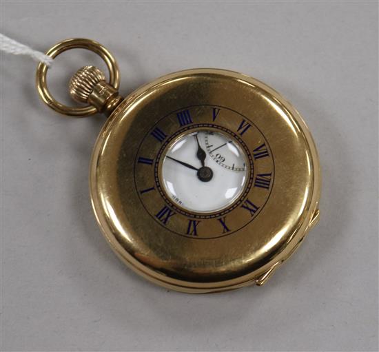 A 1920s J.W. Benson 9ct gold half hunter keyless lever pocket watch.